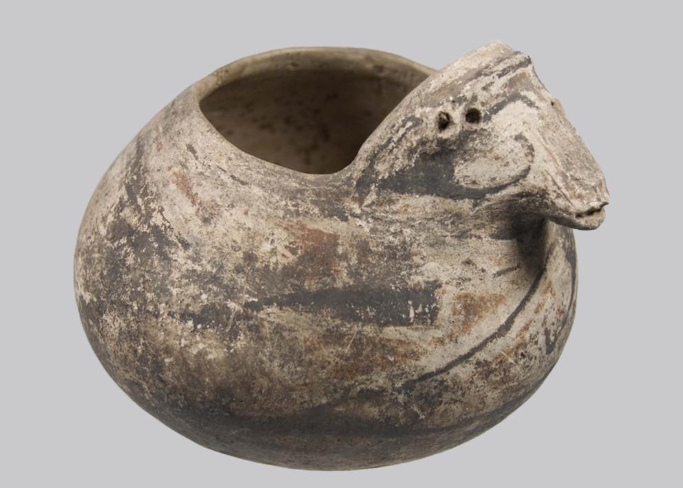 Vessel with sheep design