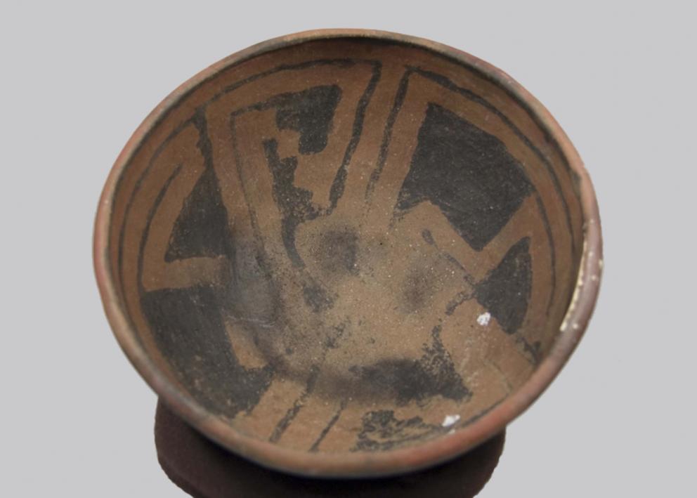 brown wide-mouthed bowl with simple geometric design