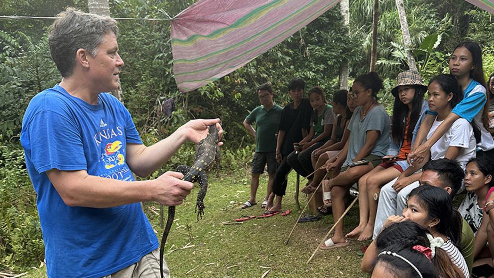 Rafe Brown making a presentation to youths in the Philippines.